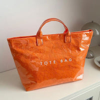 Edelinde® | Tote Tasche mit Zeitungsdruck – Orange