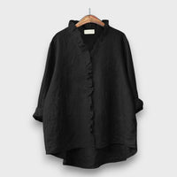 Jagina – Lockere Bluse mit Volantkante – Schwarz