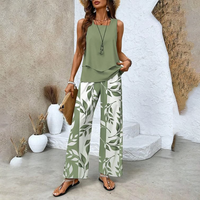 MELEK - SET AUS ÄRMELLOSER BLUSE UND PALAZZOHOSE – Dunkelgrün
