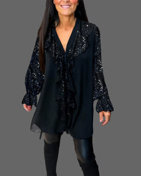Moxie – Rüschenbluse mit V-Ausschnitt und funkelnden Pailletten – Schwarz