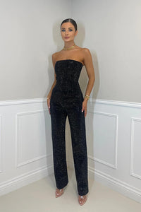 Damen Jumpsuit mit trägerlosen Oberteil und Seitentaschen – Schwarz