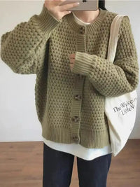 Damen Strickjacke mit Rundhalsausschnitt Knopfverschluss Ballonärmeln und Strukturmuster – Grün