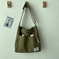 MATILDE - CORDTASCHE MIT MEHREREN FÄCHERN – Grün