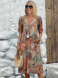 Lina | Lebendiges Midikleid mit modernem Stil – Beige