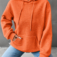 Léana™ | Texturiertes Kapuzen-Sweatshirt mit langen Ärmeln – Mandarinenrot