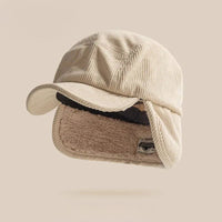Rojie™ – Gerippte Mütze mit Ohrenklappen – Beige