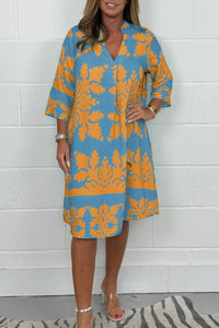 Niva | Glänzendes Frühlings-Midikleid – Orange und Blau