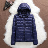 TEODORA - GESTEPPTE JACKE MIT KAPUZE – Marine