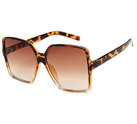 Heidi-Mode | Sonnenbrillen für Damen – Braun/Schwarz/Orange