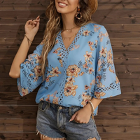 Sommerbluse mit Blumenmuster für Damen | Kurzarm – Blau
