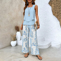 MELEK - SET AUS ÄRMELLOSER BLUSE UND PALAZZOHOSE – Blau