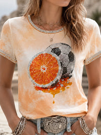 Sommerliches T-Shirt für Damen mit Obst- und Fußballmotiv – als bild
