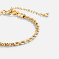 Verdrehte Chic Goldarmband – 18K Gold